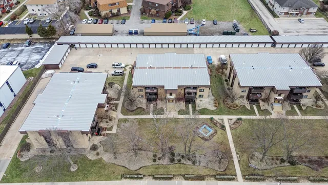 an aerial view of a house with outdoor space