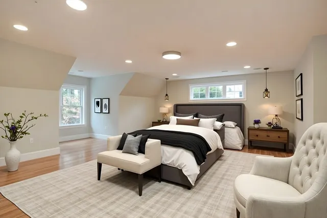 a white tub sitting next to a white sink