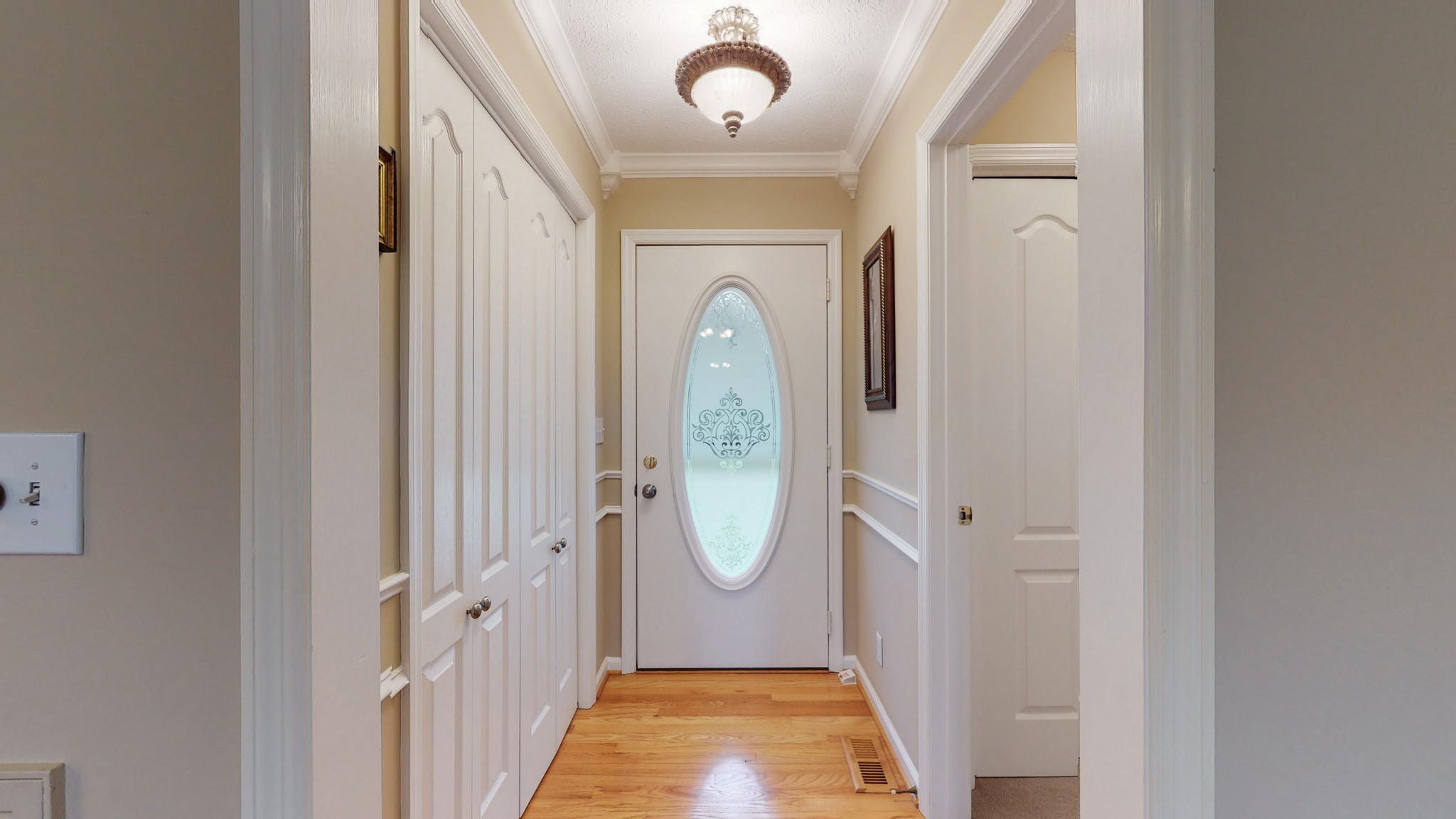 199 Spicer Road Burns, TN 37029 - Photo 14 of 34 a view of an entryway door with wooden floor
