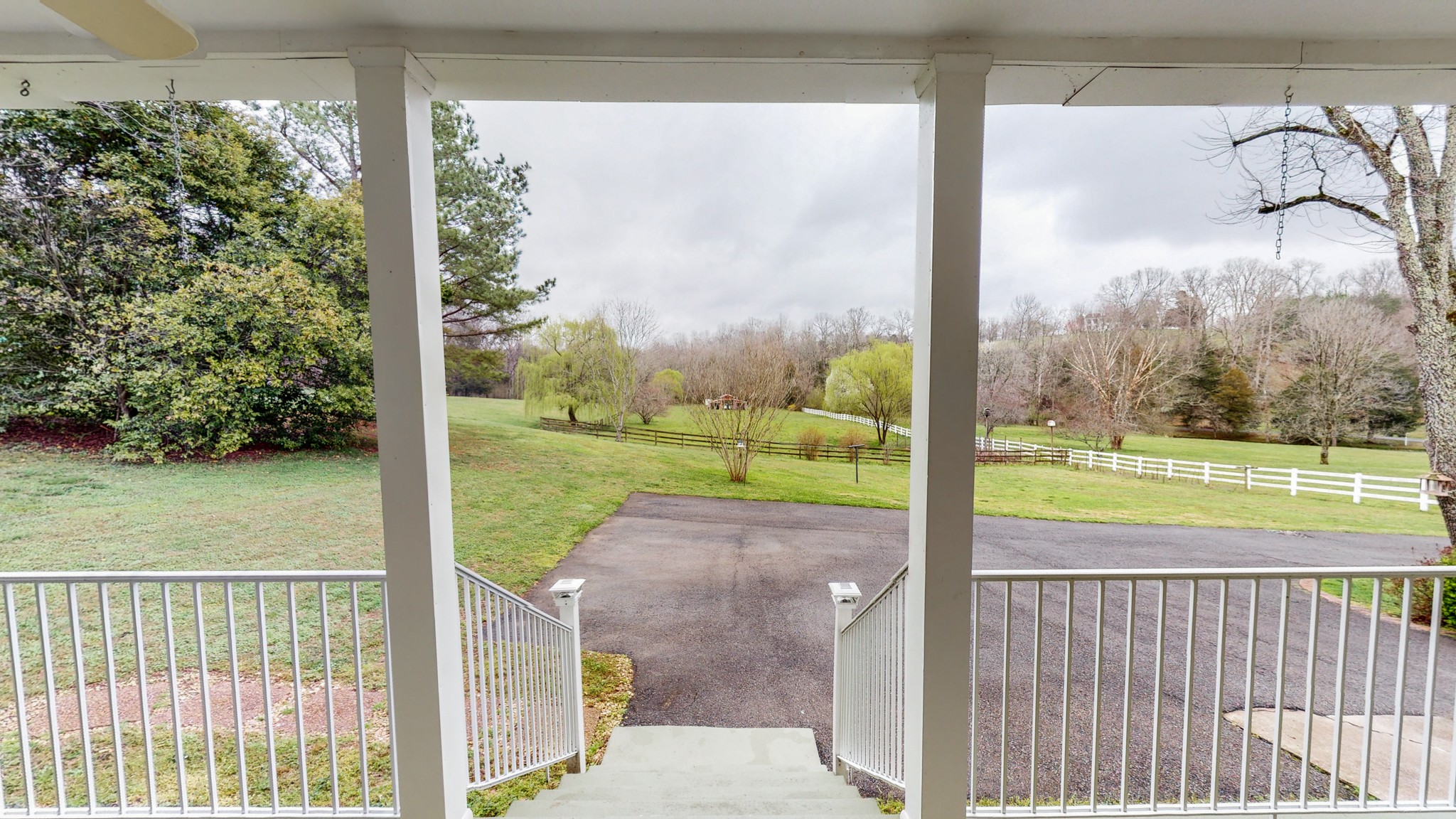 199 Spicer Road Burns, TN 37029 - Photo 3 of 34 a view of a porch with a yard