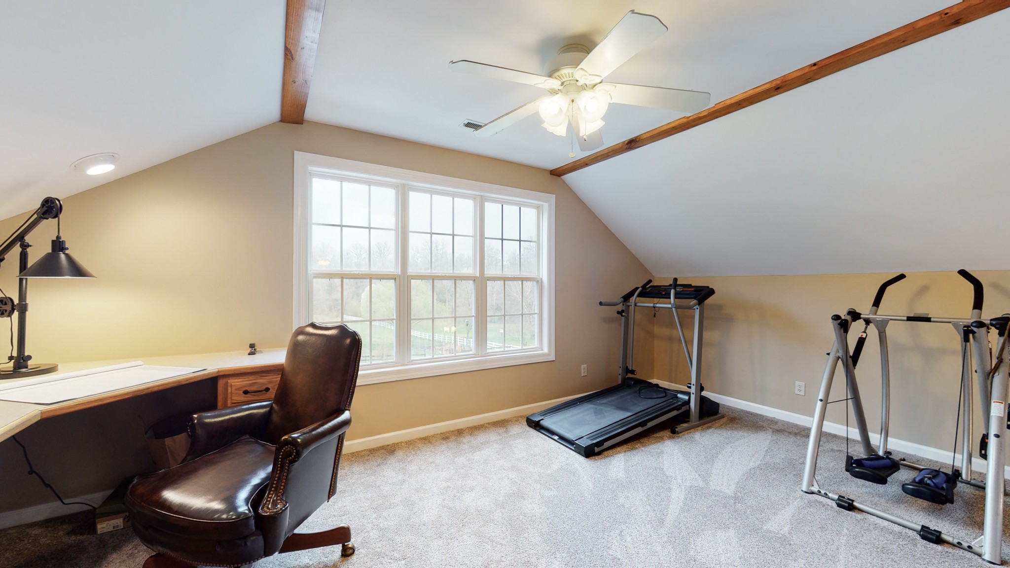 199 Spicer Road Burns, TN 37029 - Photo 22 of 34 a view of a workspace with gym equipment