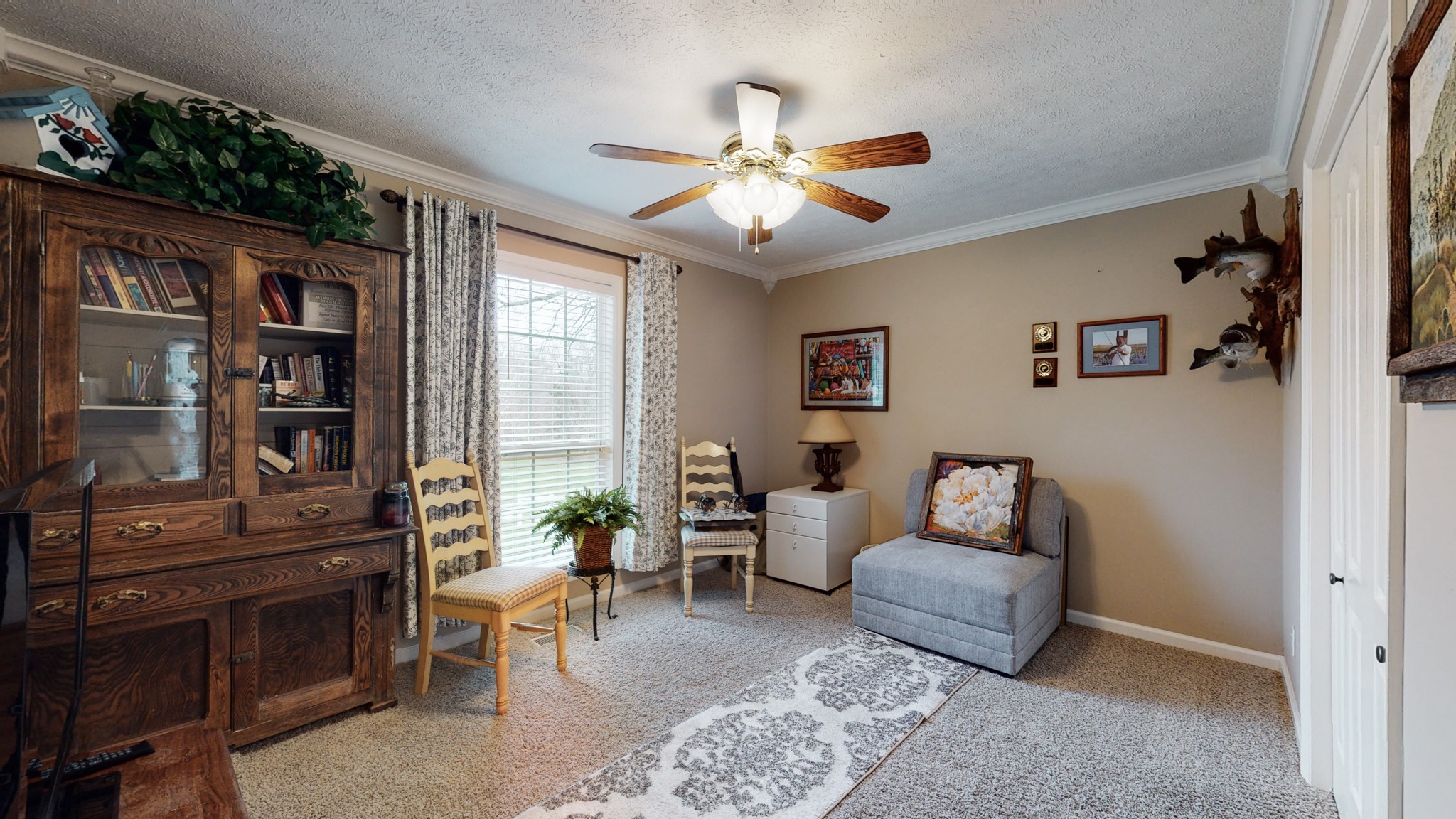 199 Spicer Road Burns, TN 37029 - Photo 27 of 34 a living room with furniture and a window