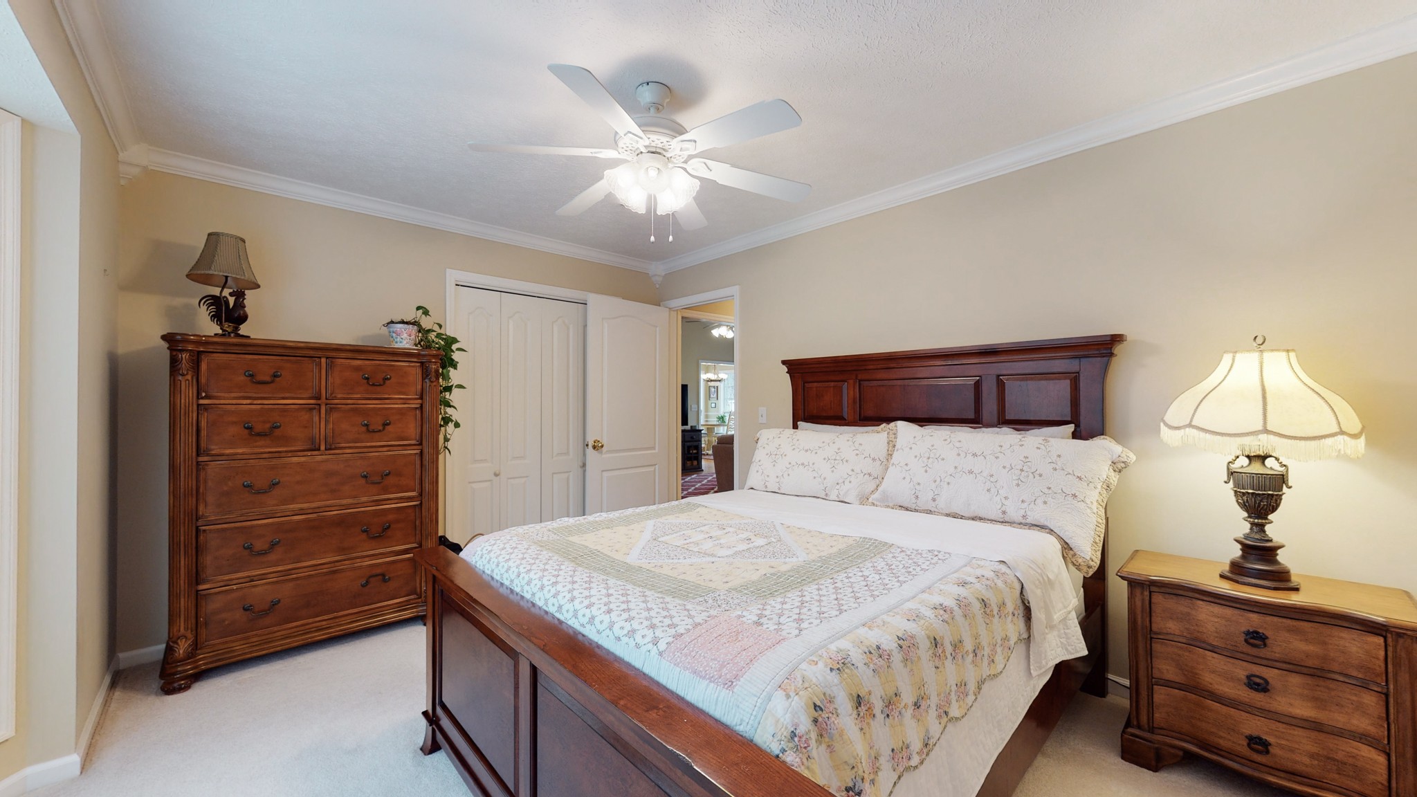199 Spicer Road Burns, TN 37029 - Photo 28 of 34 a bedroom with a bed and a dresser
