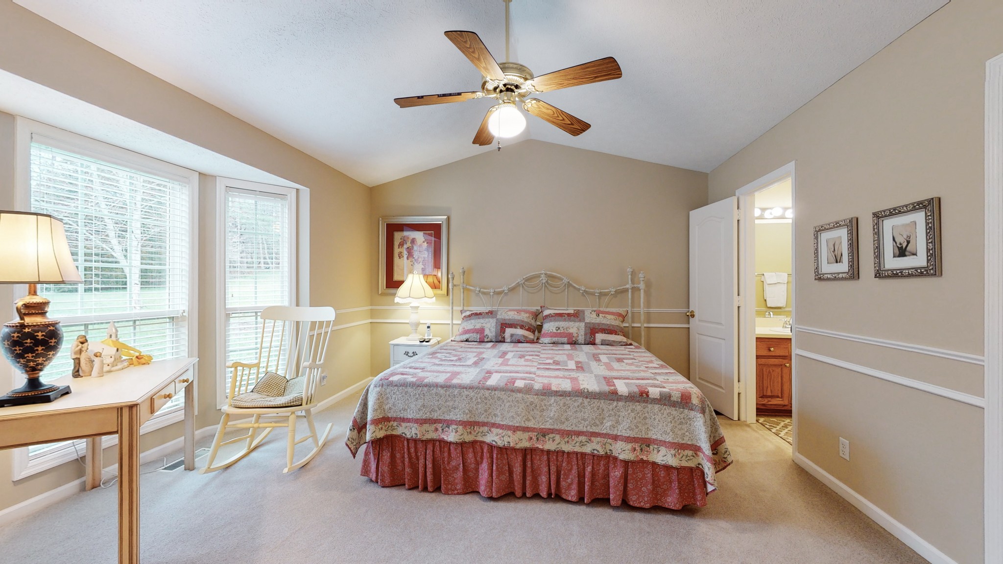 199 Spicer Road Burns, TN 37029 - Photo 29 of 34 a bedroom with a bed and wooden floor