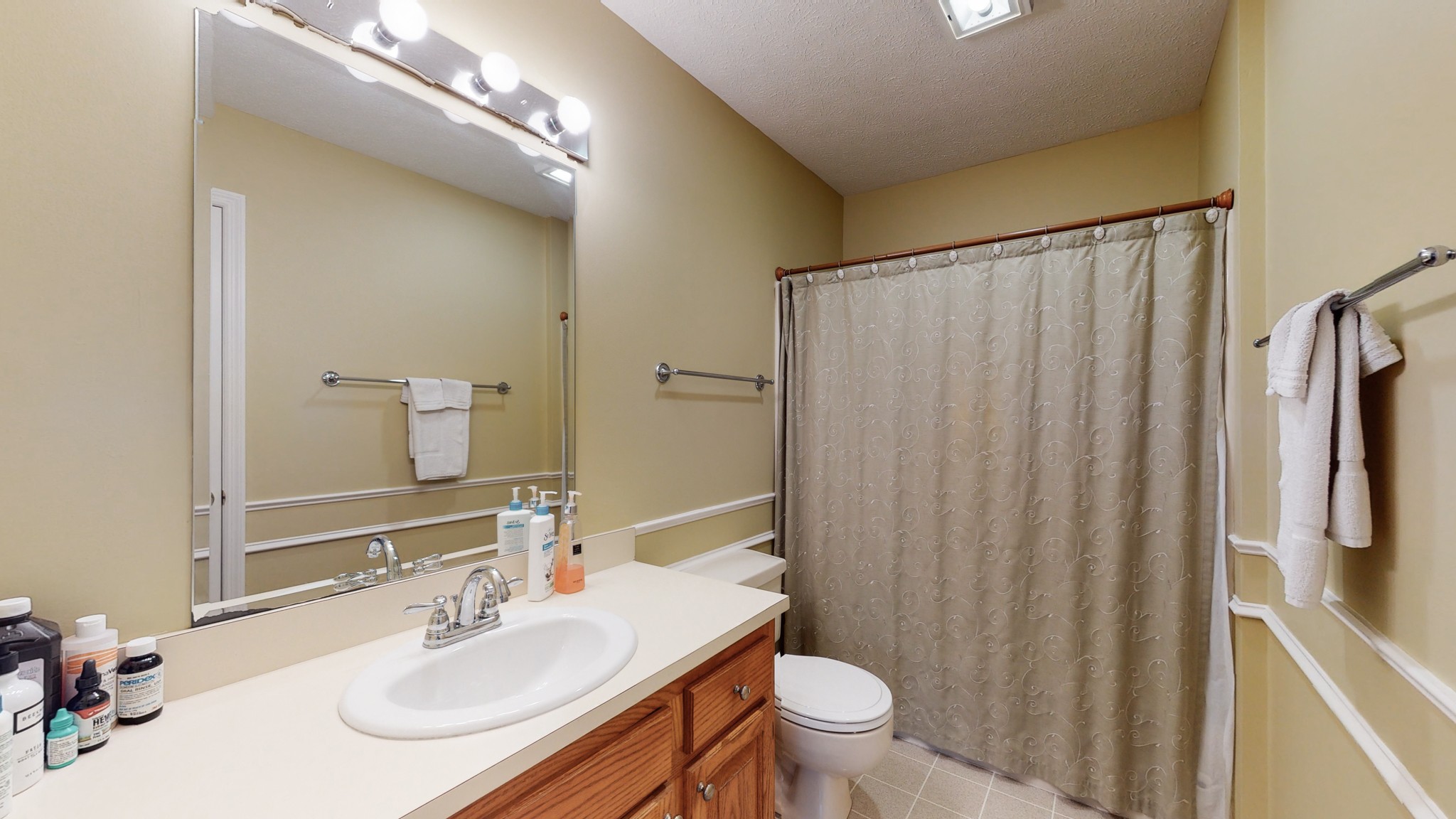 199 Spicer Road Burns, TN 37029 - Photo 31 of 34 a bathroom with a sink toilet and shower
