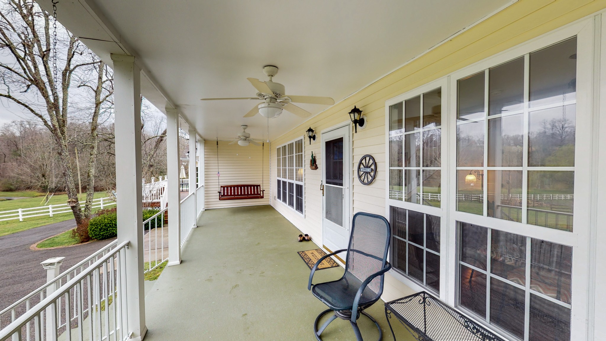 199 Spicer Road Burns, TN 37029 - Photo 7 of 34 a view of an chairs and table in the balcony