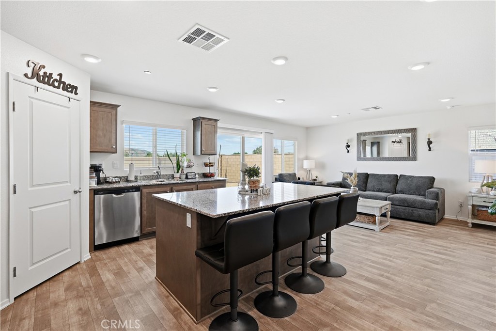 28395 Matador Road Winchester, CA 92596 - Photo 13 of 56 a kitchen with a sink appliances and cabinets