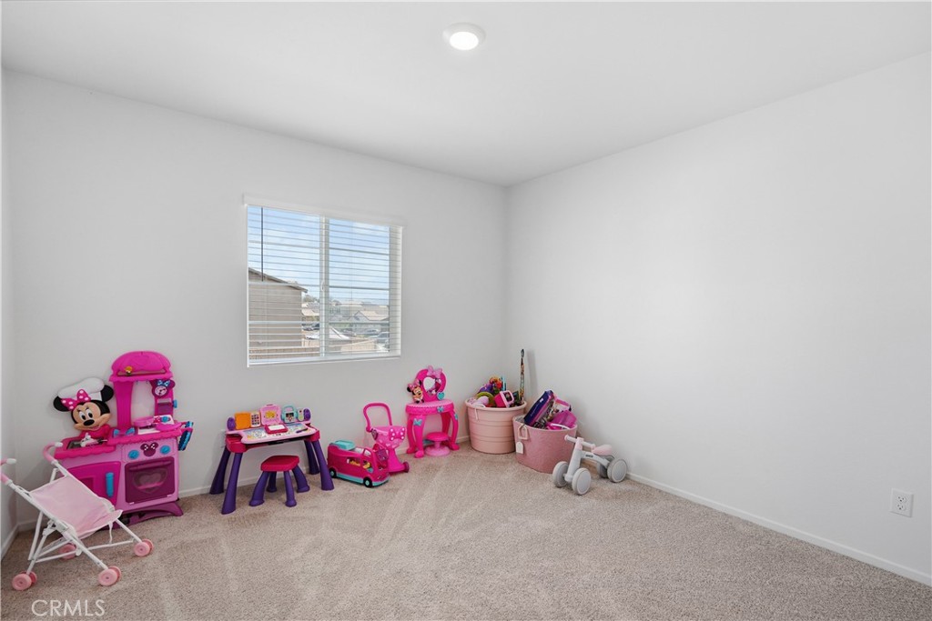 28395 Matador Road Winchester, CA 92596 - Photo 31 of 56 a bedroom with furniture and a window
