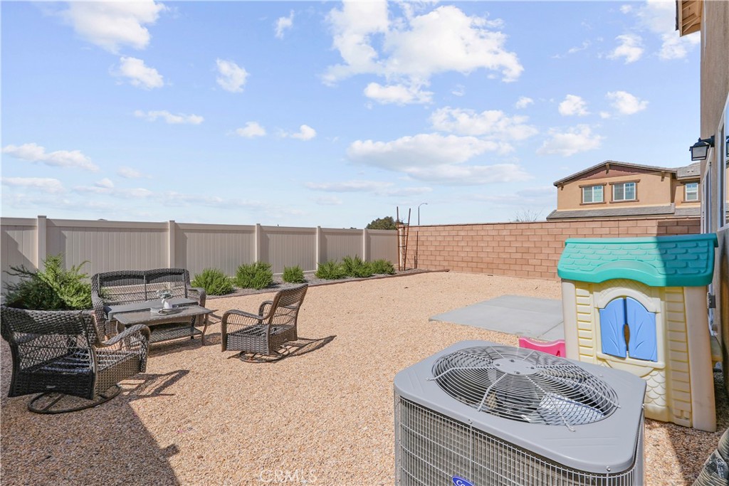 28395 Matador Road Winchester, CA 92596 - Photo 40 of 56 a building outdoor space with patio furniture