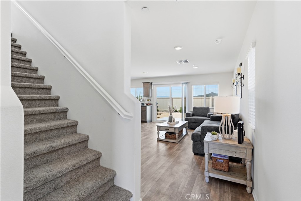 28395 Matador Road Winchester, CA 92596 - Photo 7 of 56 a living room with furniture and stairs