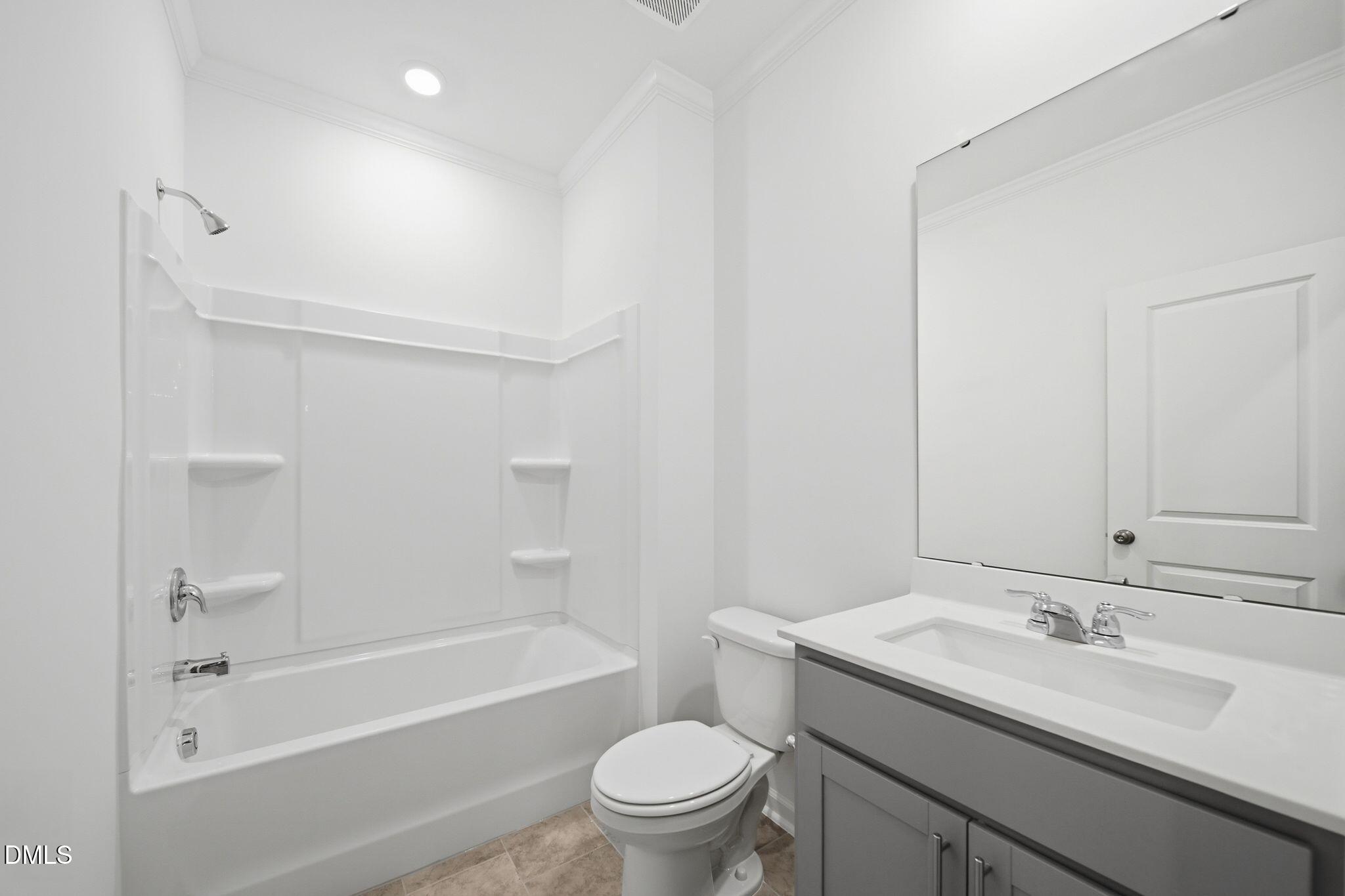 5842 Millstone Way Sims, NC 27880 - Photo 13 of 22 a bathroom with a sink a toilet and shower
