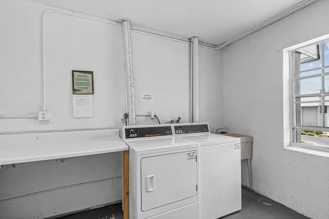 a view of cabinets and washer dryer