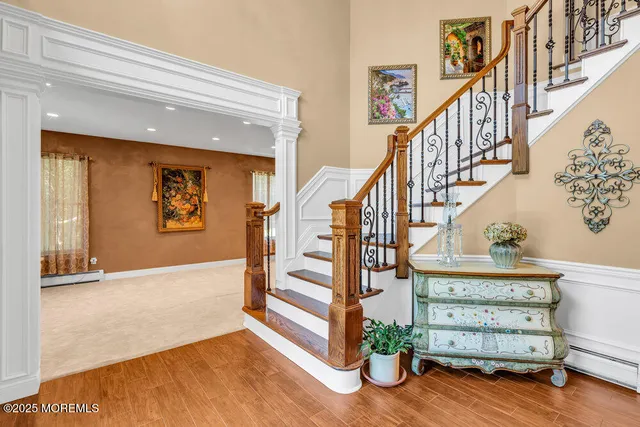 a view of an entryway with hardwood