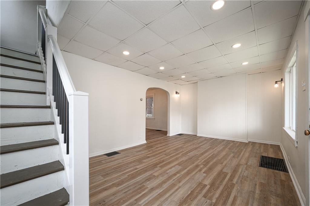 2606 Belmar Place Pittsburgh, PA 15218 - Photo 2 of 27 a view of empty room with wooden floor and fan