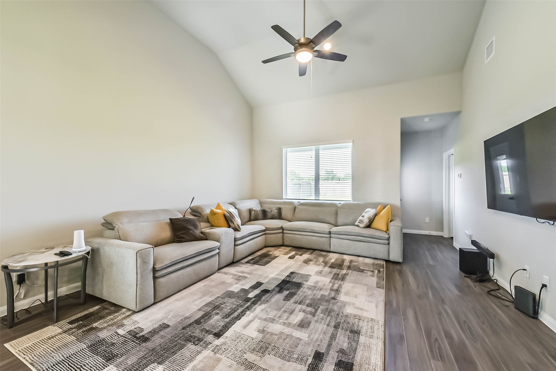 4907 Luke Matthew Drive Rosharon, TX 77583 - Photo 7 of 42 a living room with furniture and a flat screen tv