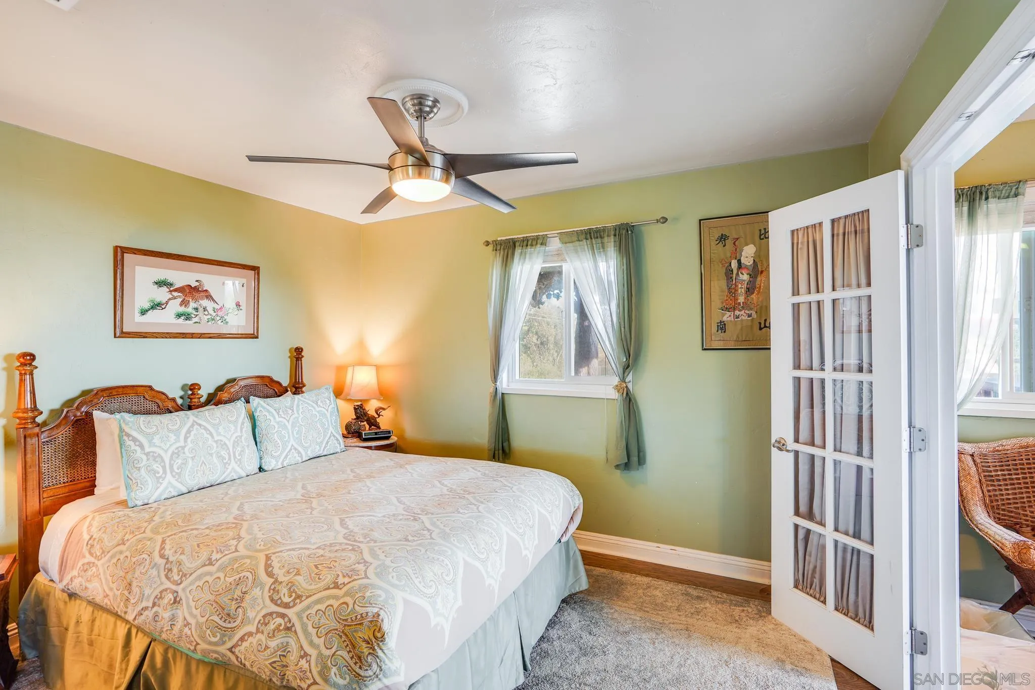 253 B Street Encinitas, CA 92024 - Photo 23 of 61 a bedroom with a bed and a window