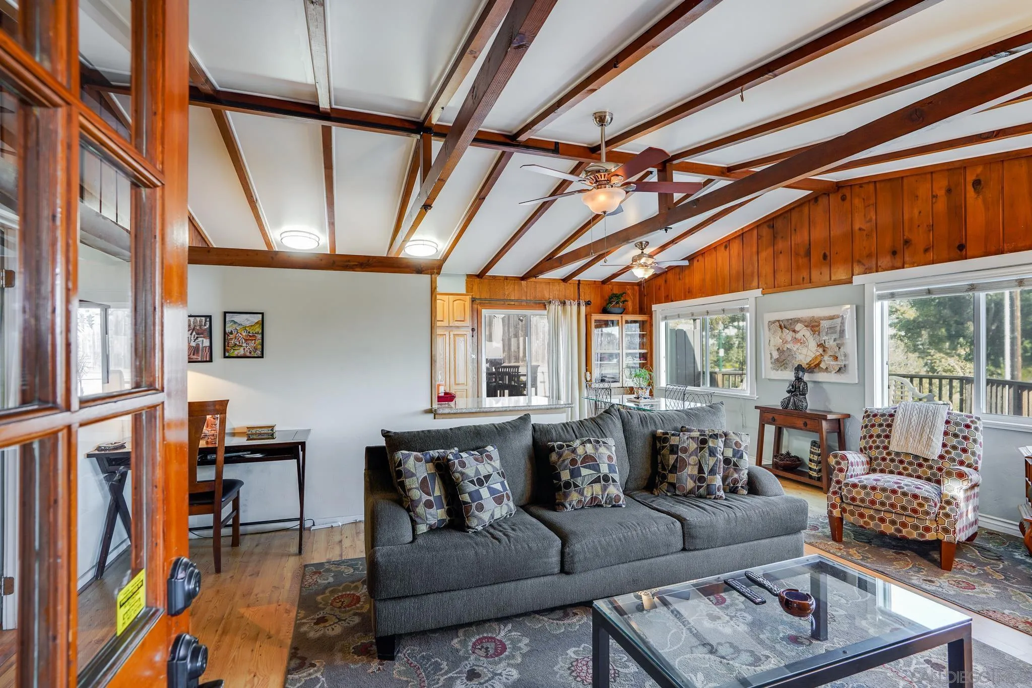 253 B Street Encinitas, CA 92024 - Photo 33 of 61 a living room with furniture and a flat screen tv