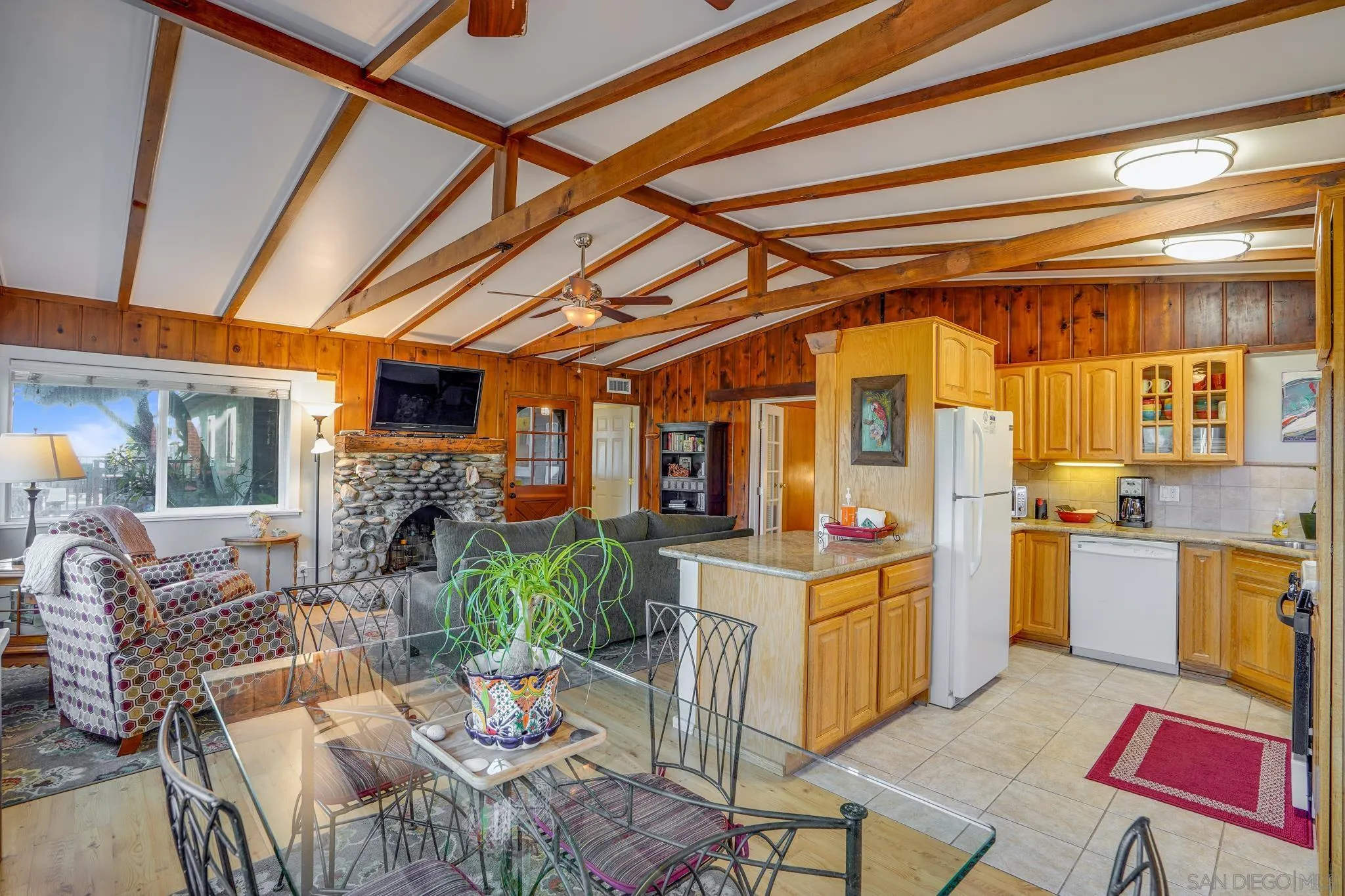 253 B Street Encinitas, CA 92024 - Photo 40 of 61 a open kitchen with stainless steel appliances granite countertop a stove and cabinets