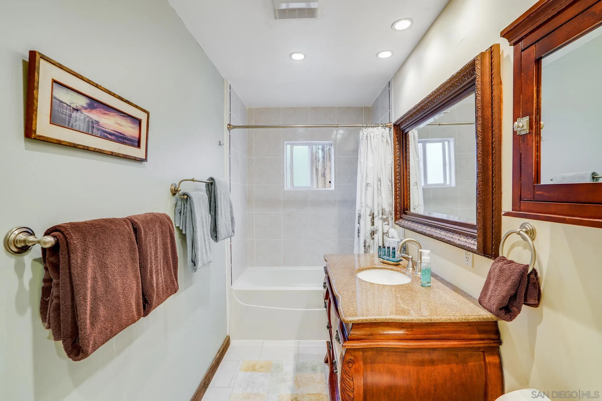253 B Street Encinitas, CA 92024 - Photo 47 of 61 a bathroom with a sink toilet and mirror