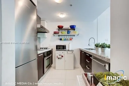 $685,000 | 720 Northeast 62nd Street, Unit 402, Miami, FL 33138