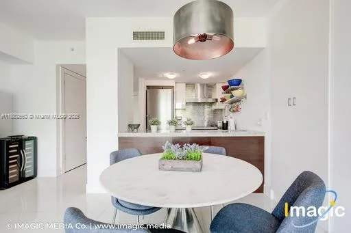 a view of a house with patio outdoor seating