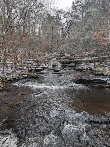 a view of water with water fall