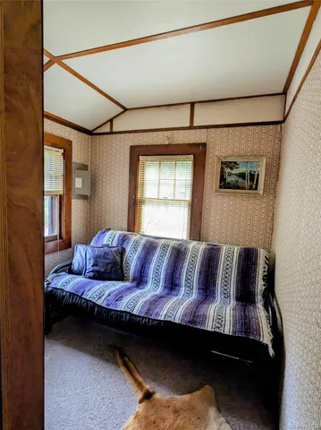 a view of living room and furniture