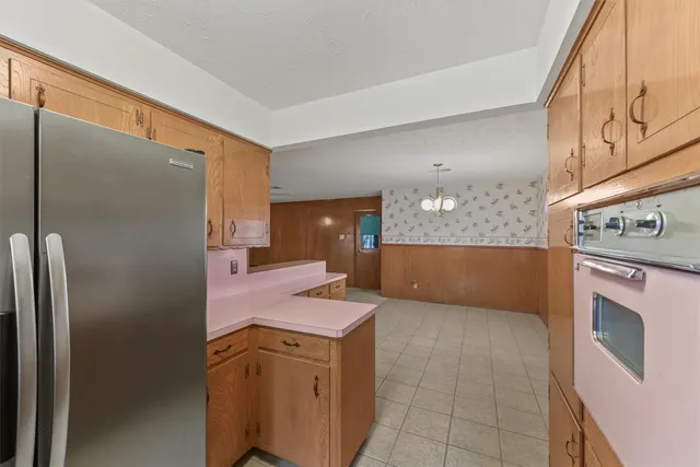 a view of a dresser with mirror