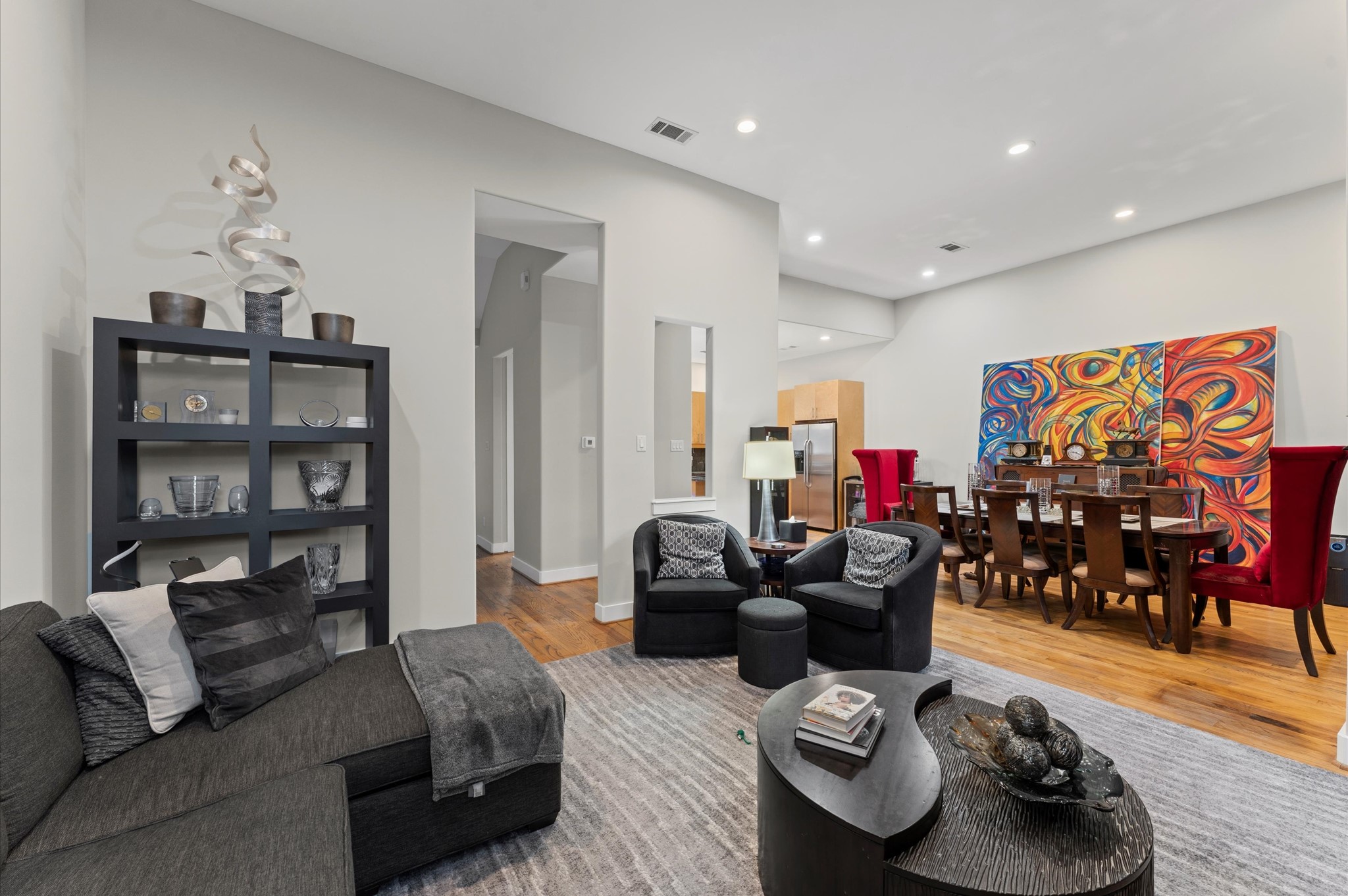 730 Ruthven Street Houston, TX 77019 - Photo 5 of 36 a living room with furniture and wooden floor