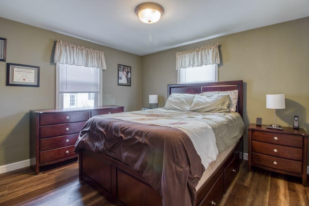 129 Amostown Road West Springfield, MA 01089 - Photo 11 of 25 a bedroom with a bed and a window