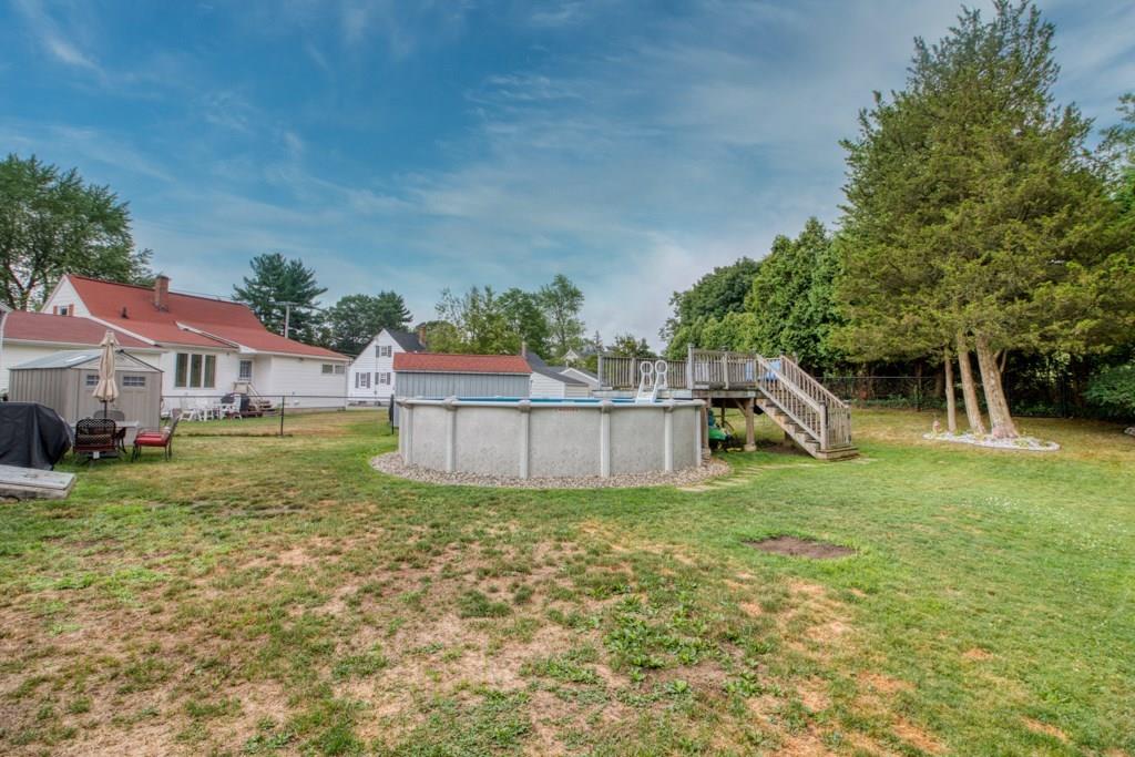 129 Amostown Road West Springfield, MA 01089 - Photo 24 of 25 a view of a house with a yard and plants