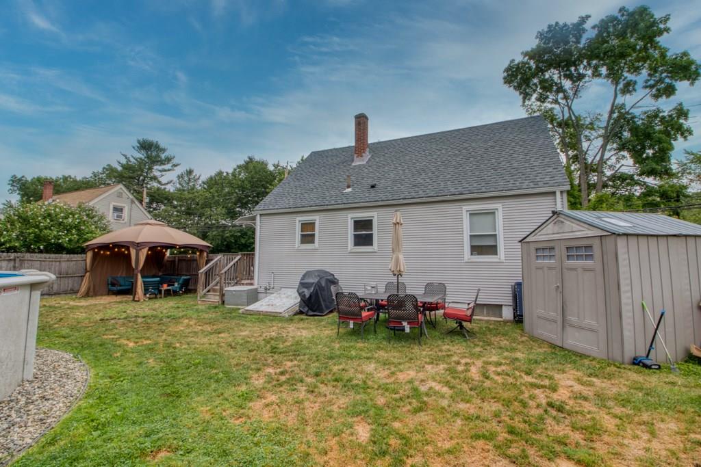 129 Amostown Road West Springfield, MA 01089 - Photo 25 of 25 a view of a house with backyard space and sitting area