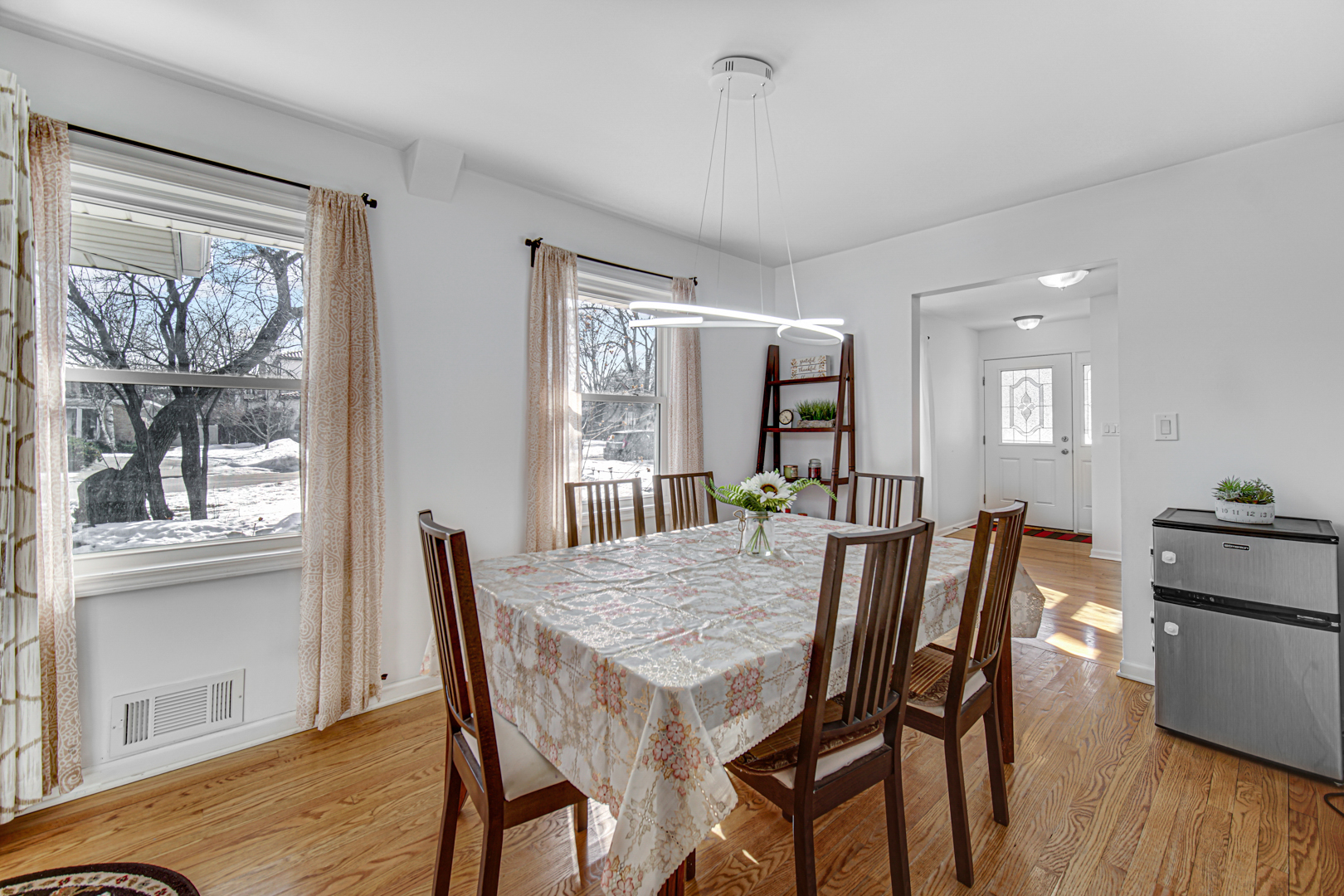 1855 North Happ Road Northbrook, IL 60062 - Photo 13 of 32 a view of a dining room with furniture window and wooden floor