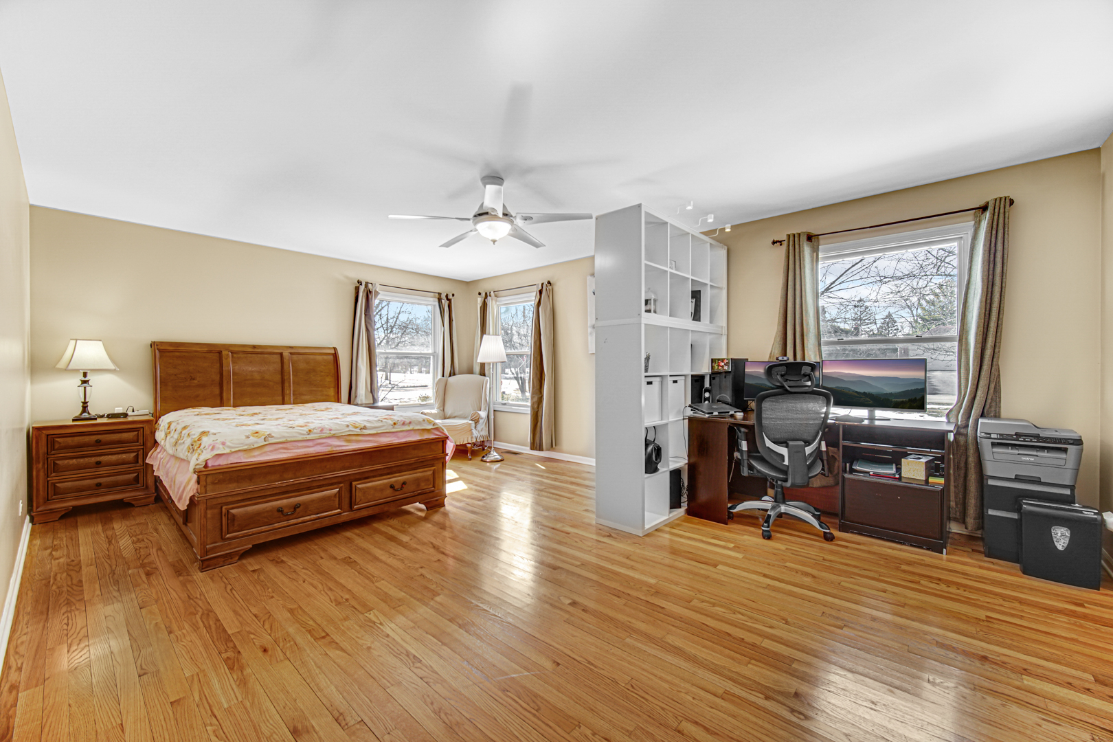 1855 North Happ Road Northbrook, IL 60062 - Photo 14 of 32 a bedroom with a bed and wooden floor