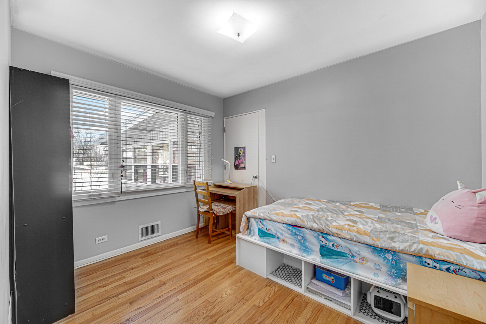 1855 North Happ Road Northbrook, IL 60062 - Photo 16 of 32 a bedroom with bed and a window