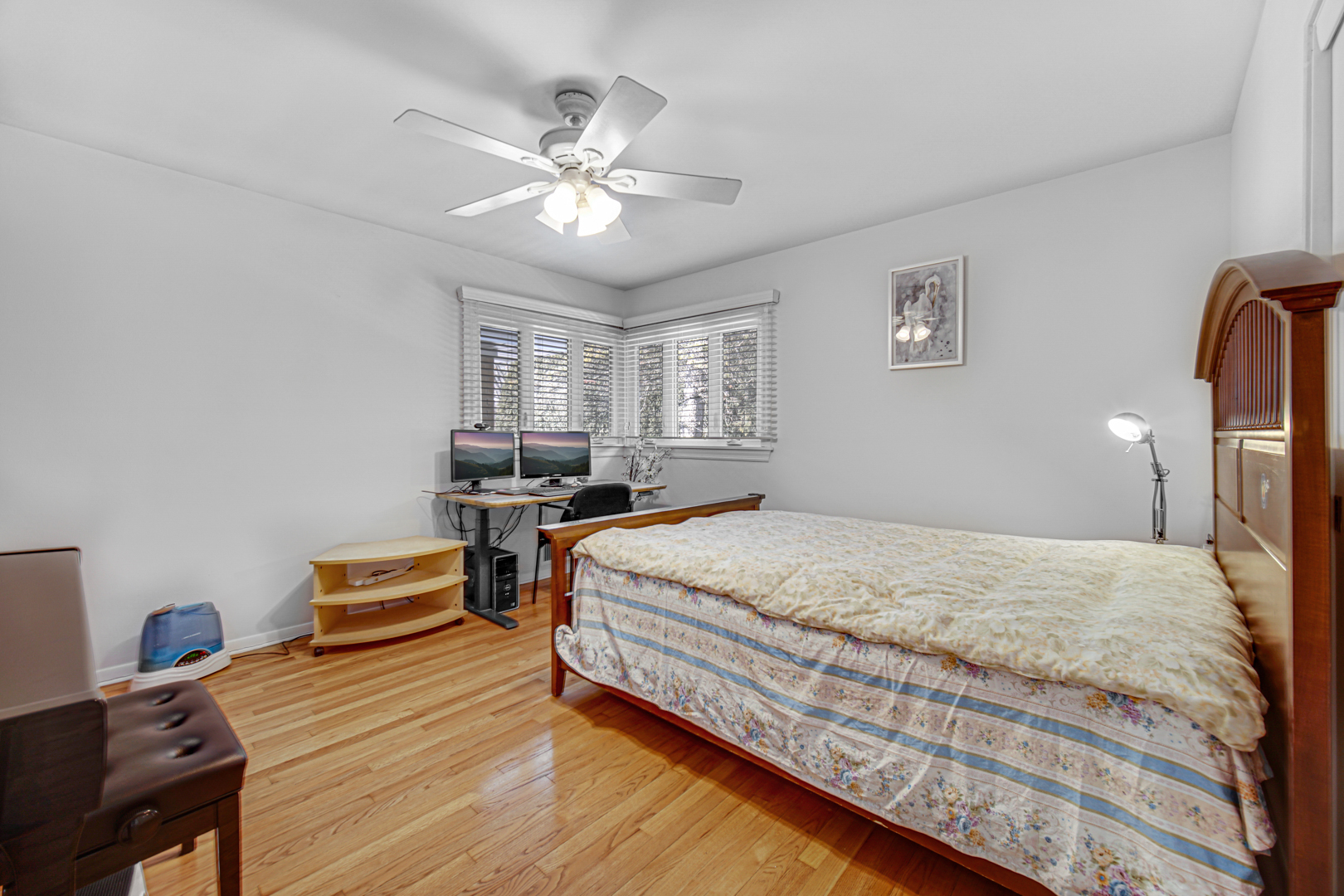 1855 North Happ Road Northbrook, IL 60062 - Photo 18 of 32 a bedroom with bed and window