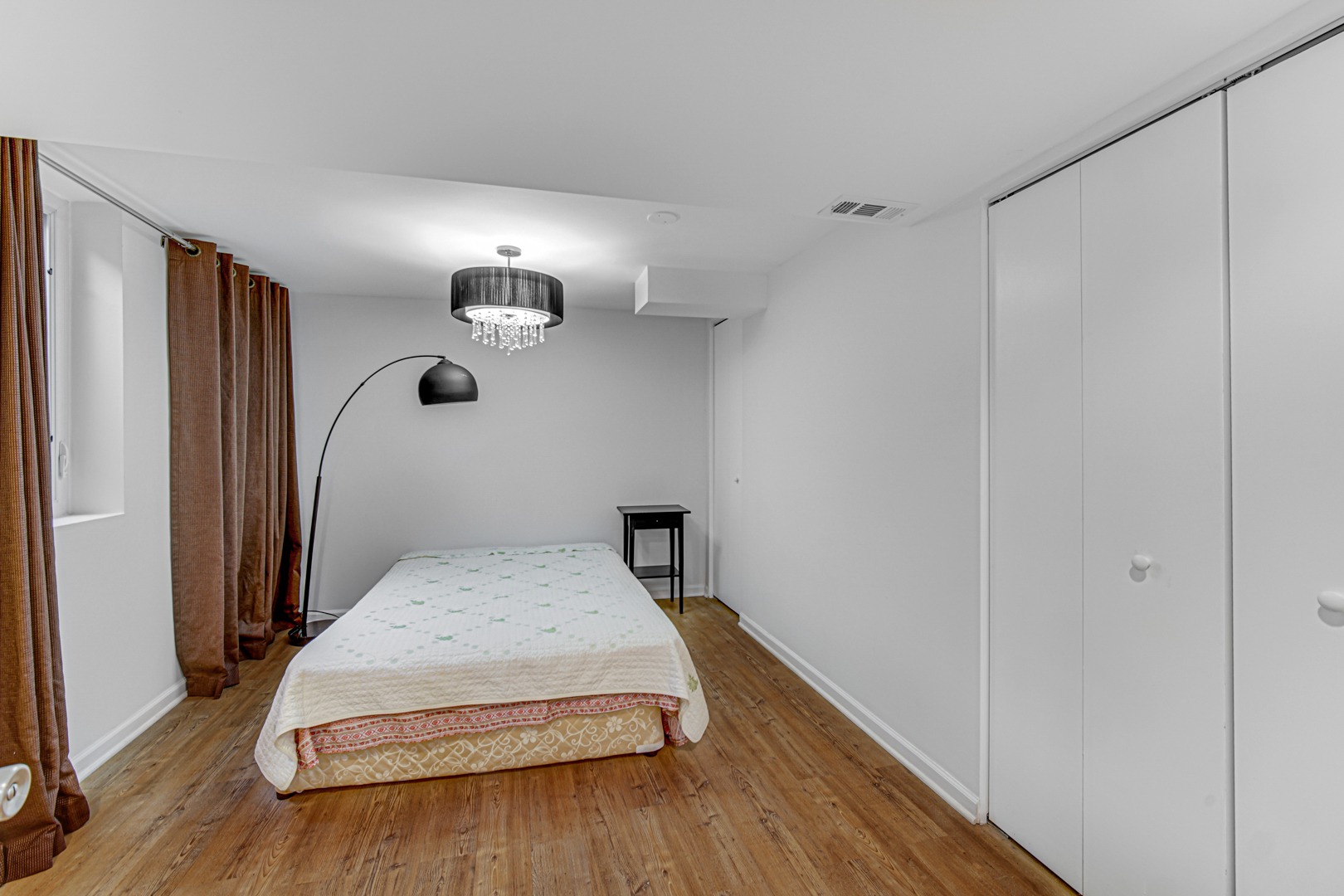 1855 North Happ Road Northbrook, IL 60062 - Photo 19 of 32 a bedroom with a bed and wooden floor