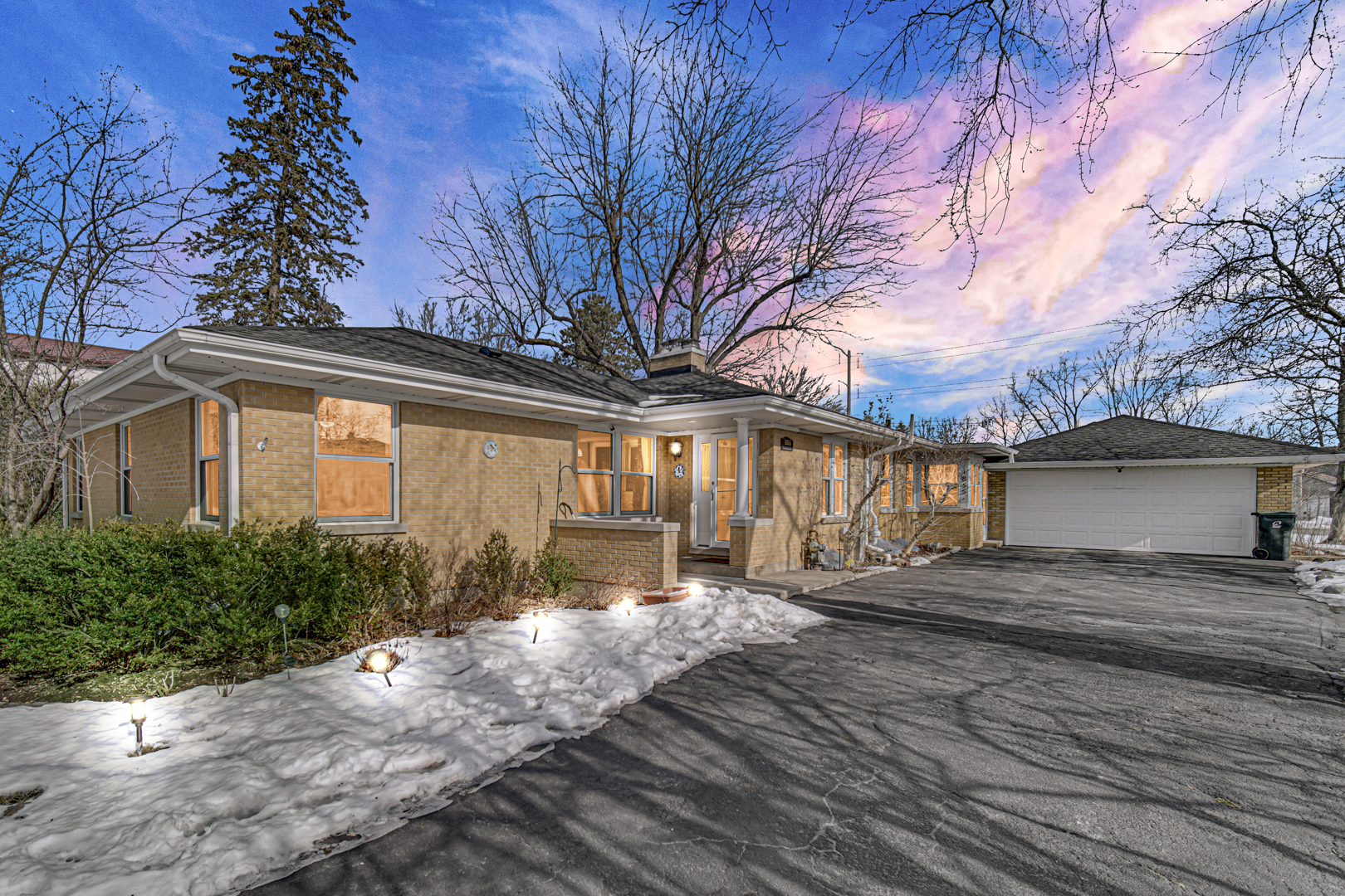 1855 North Happ Road Northbrook, IL 60062 - Photo 2 of 32 a front view of a house with yard and tree s