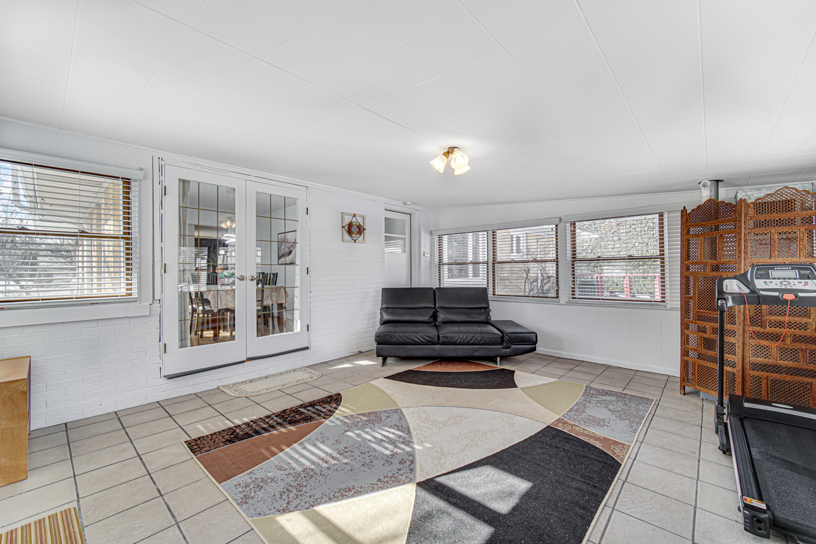1855 North Happ Road Northbrook, IL 60062 - Photo 24 of 32 a living room with furniture and a window