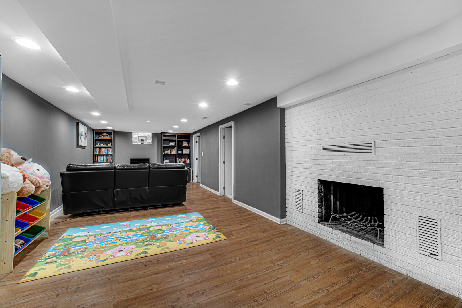 1855 North Happ Road Northbrook, IL 60062 - Photo 26 of 32 a living room with furniture and a fireplace