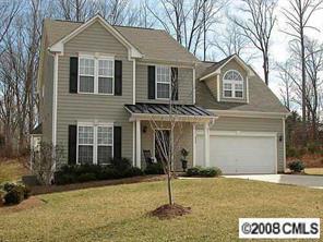 854 Haymarket Place Fort Mill, SC 29708 - Photo 1 of 8 a front view of a house with a yard