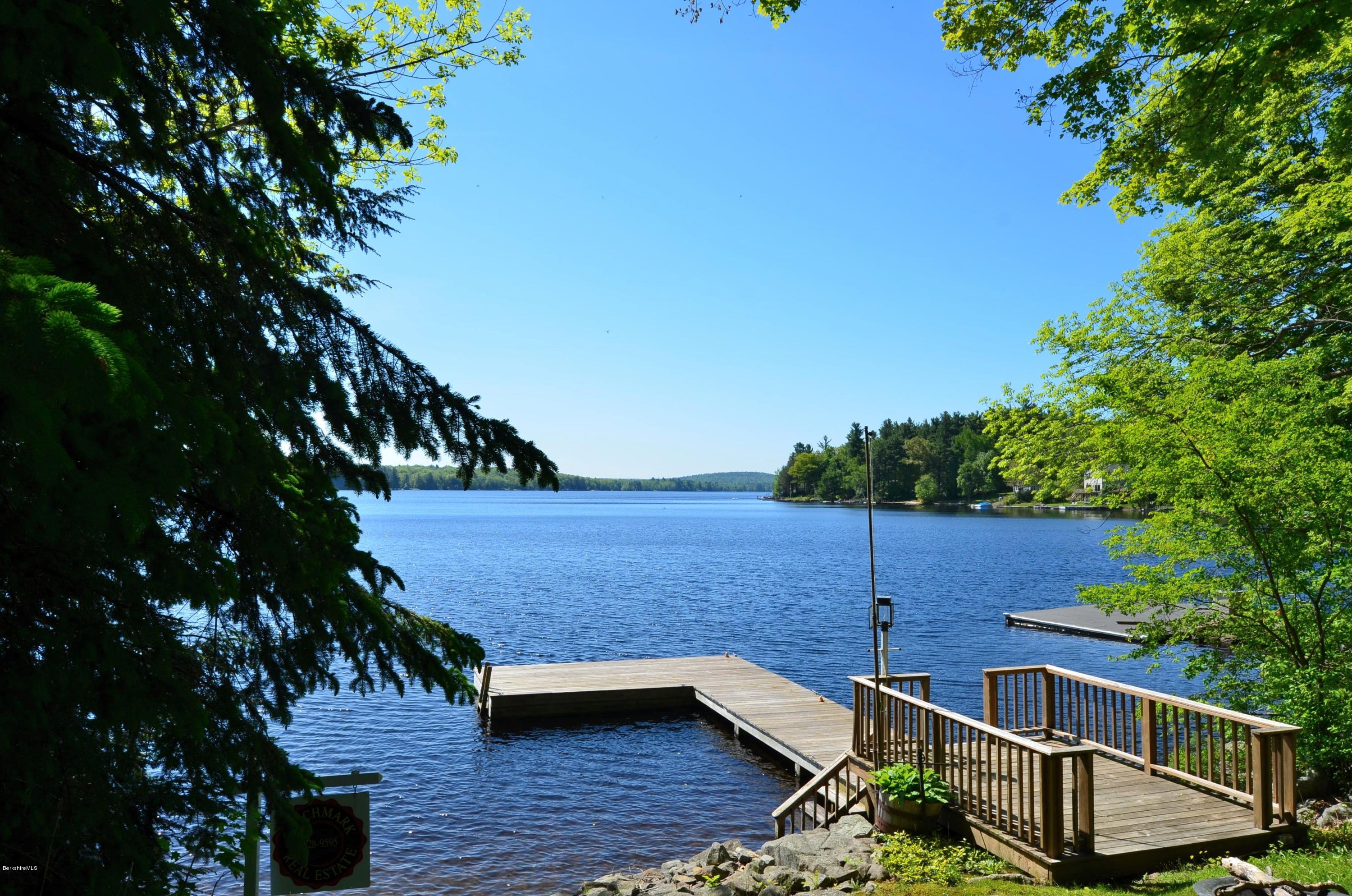 996 Reservoir Road Otis, MA 01029 - Photo 2 of 23 a view of yard with outdoor seating and trees