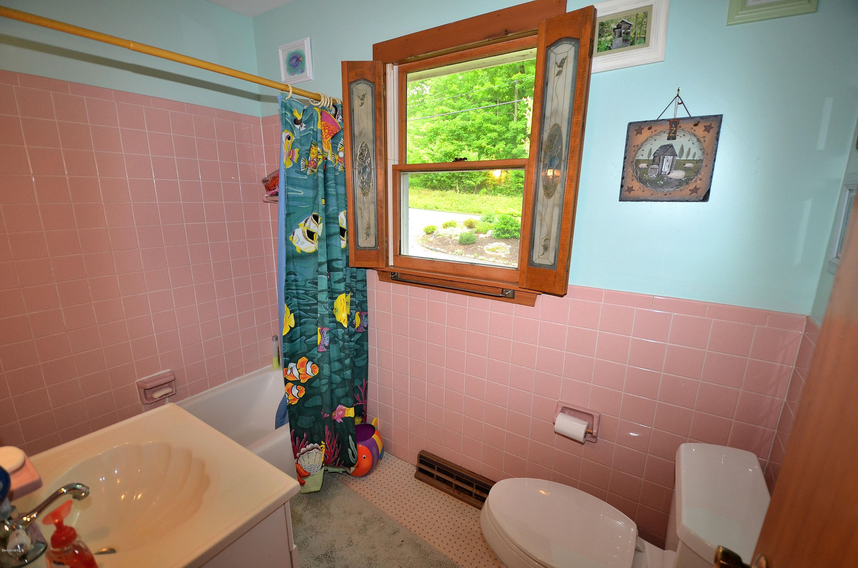 996 Reservoir Road Otis, MA 01029 - Photo 12 of 23 a bathroom with a toilet a sink and a shower