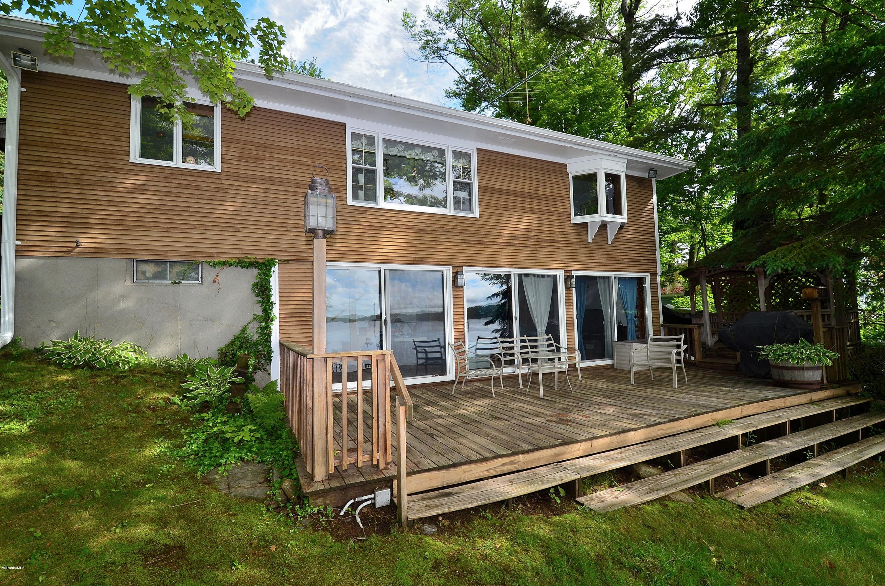 996 Reservoir Road Otis, MA 01029 - Photo 22 of 23 a view of a house with backyard