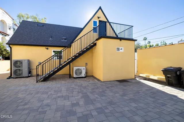 a view of a balcony with wooden floor