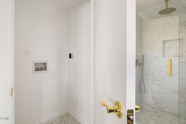 a view of a house with a street