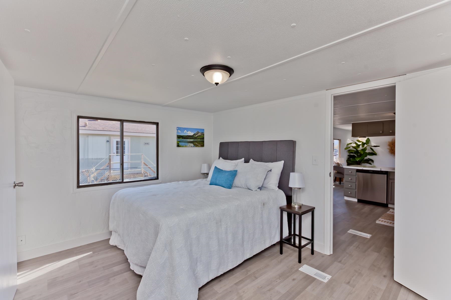 432 Pisces Circle Fruita, CO 81521 - Photo 16 of 40 a bedroom with a bed and window