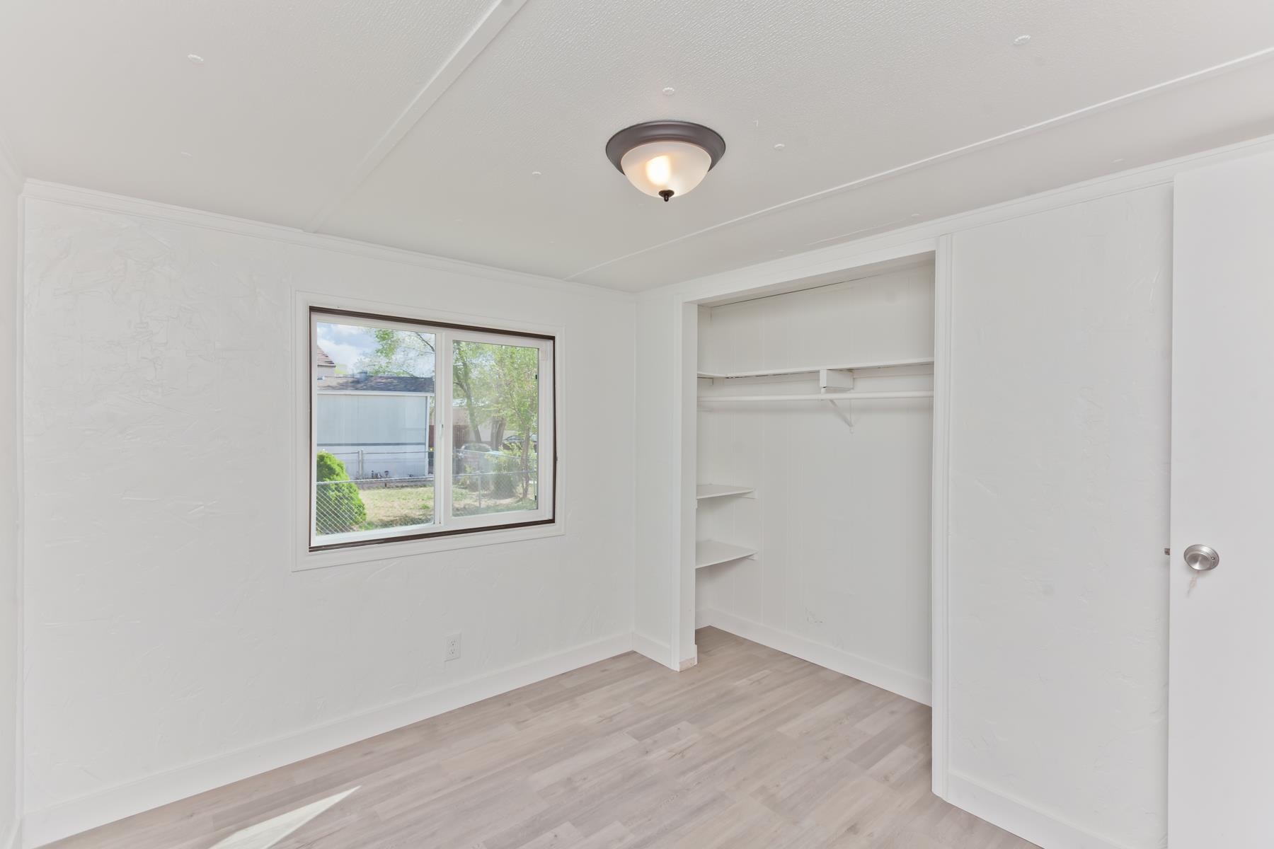 432 Pisces Circle Fruita, CO 81521 - Photo 24 of 40 an empty room with windows