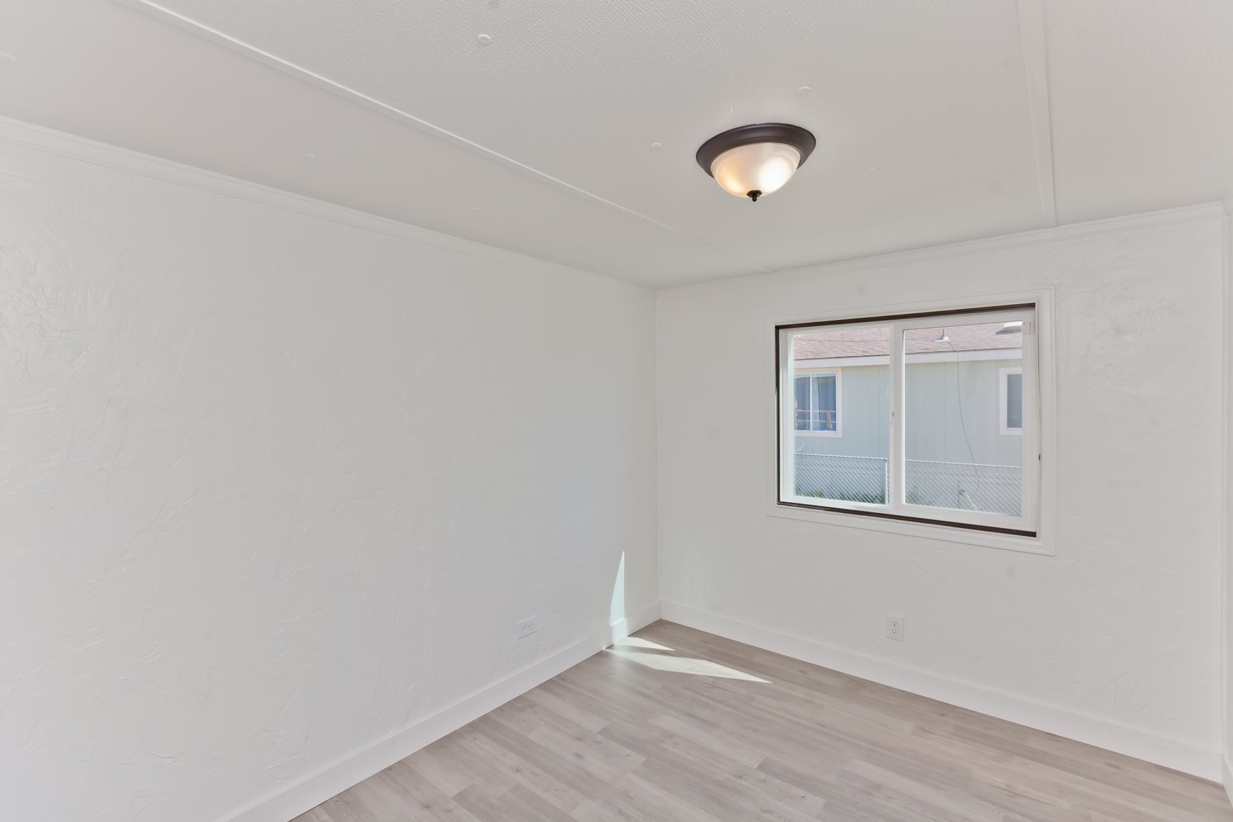 432 Pisces Circle Fruita, CO 81521 - Photo 25 of 40 an empty room with a workbench