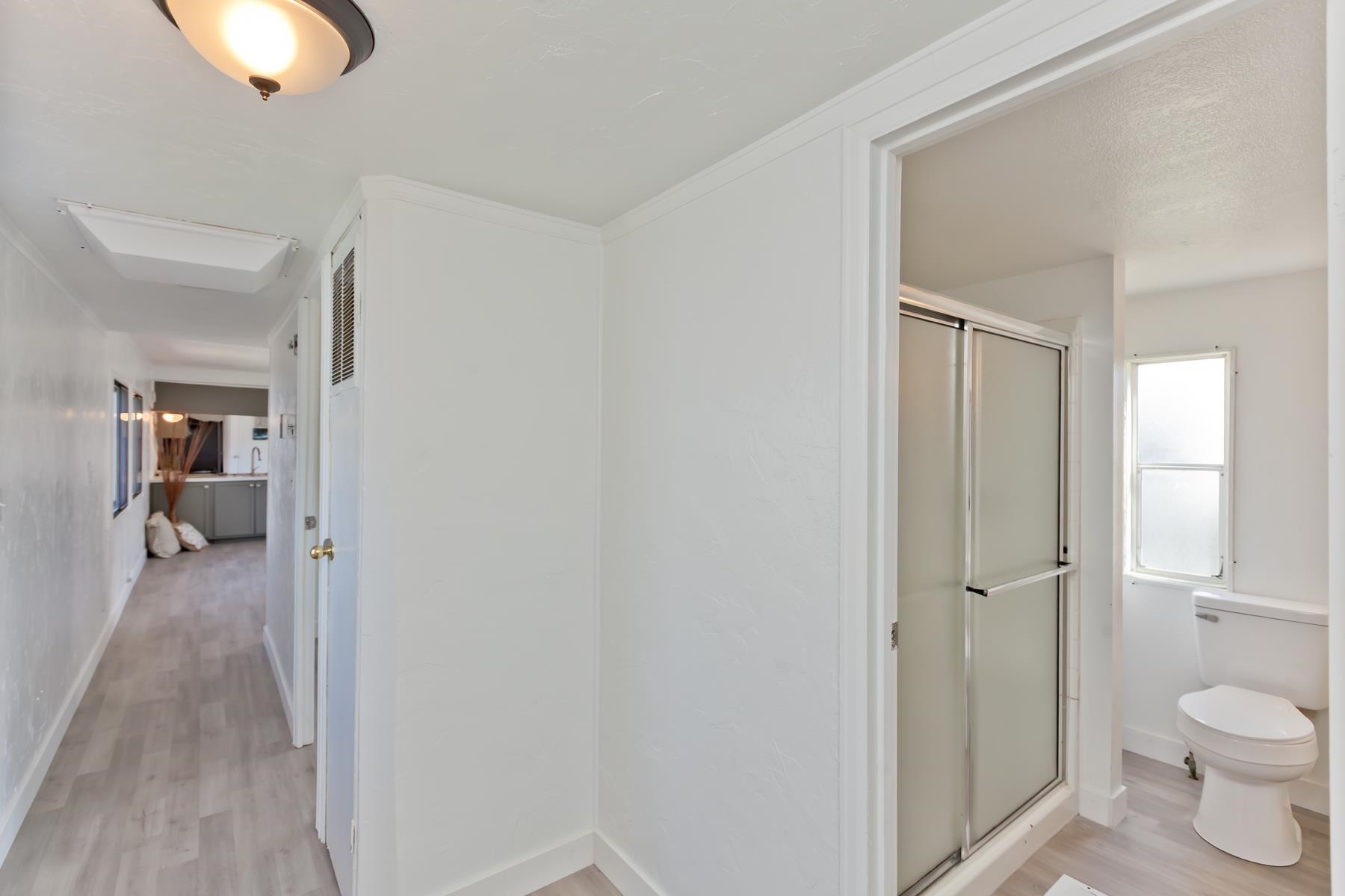 432 Pisces Circle Fruita, CO 81521 - Photo 30 of 40 a bathroom with a granite countertop sink a toilet and a mirror